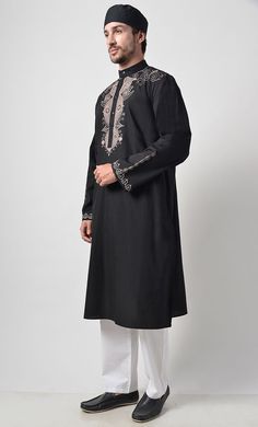 Fabric is 100% cotton Poplin Front button down Mandarin collar Front yoke and sleeves embroidered Length is 42-44" Side Pockets Machine wash cold with like colors and tumble dry Festive Cotton Kurta With Embroidered Sleeves, Cotton Kurta With Embroidered Sleeves For Eid, Casual Cotton Kurta For Winter, Festive Cotton Traditional Wear With Embroidered Sleeves, Embroidered Traditional Fit Long Sleeve Kurta, Embroidered Long Sleeve Kurta With Traditional Fit, Embroidered Long Sleeve Traditional Fit Kurta, Embroidered Long Sleeve Traditional Kurta, Casual Festive Traditional Wear With Long Sleeves