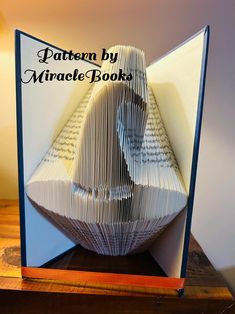 an open book with folded pages and the words pattern by wrack's book