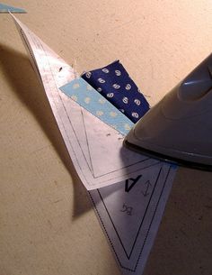 an ironing board with a piece of fabric next to it