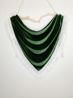 "We love the vibe of these boho inspired bridal wedding shawls. They are a super chic option for all brides! The unique, romantic design will add drama to your photos and make for a stunning accessory that all your guests will be talking about! A high-fashion handmade Arrow and Thread velvet shrug shawl is a gorgeous addition to your wedding look and we've got you covered! Literally! The handmade stretch velvet shawl wraps are made with high quality fabrics and trims. Each shawl has an open fron Green Bohemian Shawl For Festival, Bohemian Wedding Scarves For Festive Season, Bohemian Wedding Scarves With Traditional Drape, Green Bohemian Dupatta For Traditional Ceremonies, Bohemian Green Wedding Dupatta, Bohemian Shawl Scarves For Wedding, Bohemian Shawl Scarf For Wedding, Bohemian Wedding Shawl Scarves, Bohemian Wedding Shawl Scarf