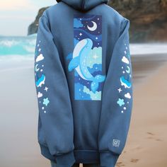 Drift along and let these cute little whale's tag along wherever you choose to go~ 🐋 Cotton with fleece interior🐋 Soft and cozy!🐋 Embroidered details on the front and sleeve detail🐋 Kamiaristudio logo tag on right sleeve and inside🐋Drawstrings have metal aglets🐋Unisex sizing ( see size chart for measurements) Model is 5'5" wearing a size S Embroidered Gifts, Terry Cloth, Marine Life, Caribbean Netherlands, Brunei