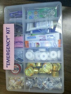 a clear plastic container filled with lots of different types of candies and other items