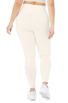 An on-trend high waistline on our classic Airbrush legging. Spotted on basically every it-girl, the High-Waist Airbrush Legging has an on-trend rise and all the best assets of the classic version, like no side seams and a yogi-tested fit that lifts and sculpts. Sculpts, smooths & lifts! No side seams & flat-locked seams for extra comfort Designed & uniquely fit to flatter every size Wear-tested by our in-house team for the perfect fit Alo Yoga® | High-Waist Airbrush Legging in Ivory, Alo Yoga Cotton Activewear For Sports, White Activewear With Go-dry Micro-elastic Fit, Cream Stretch Activewear For Sports, Micro-elastic Breathable White Bottoms, White Micro-elastic Sports Bottoms, Sporty Stretch Cream Activewear, White Micro-elastic Bottoms For Sports, Cream Stretch Sporty Activewear, White Moisture-wicking Relaxed Fit Activewear