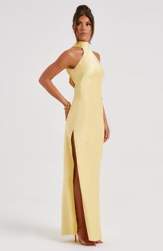 Here's to the nights you will remember because of the fits you won't forget. You will be unforgettable in Etta, our luxe maxi made from bias cut satin that skims beautifully over the body. The dress is completely backless with a high neck and an oversized tie neck detail. Elevate any look with Etta, platform heels and a sleek knot. 



Colour: Lemon.

Luxury bias cut satin.

High neckline.

Backless detail.

Skims over the figure.

Flares gently at the hem.

Maxi length.

Model is an XS and is w Homecoming Dresses Corset, Be Unforgettable, Midi Dress Wedding Guest, Long Sleeve Homecoming Dresses, Dresses Flowy, The Nights, Homecoming Dresses Long, Maxi Dress Sale, Sparkle Dress