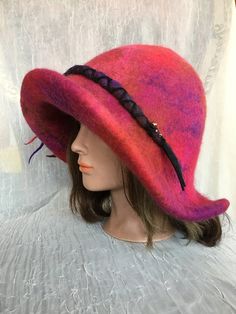 Love how this hat came out ! Red wet Felted flapper hat Ooak . Decorated with wet Felted flower. Beaded . Mannequin head size is 21 , will fit up to 23.5 created as one of a kind. Brim can be pulled o we the ears . Feel free to email me any questions. Thanks. Brimmed Felt Cloche Hat For Winter, Winter Felt Brimmed Cloche Hat, Winter Felt Cloche Hat With Brim, Winter Felt Cloche Hat With Short Brim, Red Brimmed Felt Hat For Winter, Red Wool Winter Hat, Red Adjustable Winter Felt Hat, Red Wool Felt Hat With Curved Brim, Red Wool Felt Hat For Winter