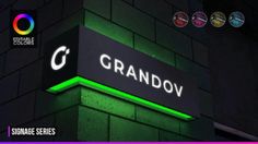 an illuminated sign on the side of a building that says grandov in black and green