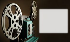 an old fashioned movie projector with a white square in the middle and black background