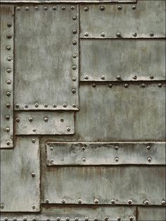 an abstract metal background with rivets and screw holes in the form of rectangles