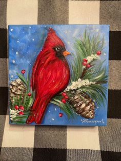 a painting of a cardinal sitting on a pine tree branch