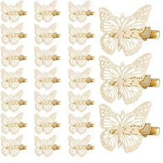 the butterfly clips are gold and have white butterflies on them