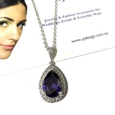 "A something blue navy sapphire cz drop bridal necklace with teardrop pendant made of cubic zirconia teardrop and brilliant cz hanging onto white gold silver rhodium bail and chain. You may also choose violet purple, emerald green or topaz brown pear drop to match your outfit or as a gift. Pendant is 1 1/4\" (3.1cm). Chain length can be added with a 2\" extender chain. View matching, similar design and other color options at https://etsy.me/2XN9lO3 View all something blue designs at https://etsy Crystal Pendant Jewelry With Halo Setting, Dazzling Elegant Pear-shaped Jewelry, Formal Teardrop Pendant Jewelry Sets With Cubic Zirconia, Formal Cubic Zirconia Jewelry Set With Teardrop Pendant, Dazzling Pear-shaped Elegant Jewelry, Formal Cubic Zirconia Teardrop Pendant Bridal Necklace, Dazzling Crystal Teardrop Pendant Jewelry, Formal Cubic Zirconia Teardrop Bridal Necklace, Cubic Zirconia Pendant Jewelry Sets For Wedding