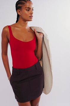 So sleek curve-hugging bodysuit featuring a dipped neckline and low U-back. * Stretch fit * Built-in shelf bra * Snap button thong | Clean Lines Bodysuit by Intimately at Free People in Red, Size: M/L Red Dahlia, Free People Store, Built In Shelves, Shelf Bra, Small Bust, Boho Outfits, Clean Lines, Dahlia, Snap Button