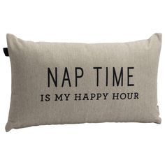 a pillow with the words nap time is my happy hour printed in black on it