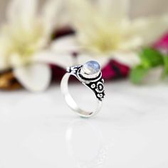 》D E T A I L S《 ✦Stone :- Moonstone ,  ✦Stone Size:-5x7 MM, ✦Stone Shape:- Oval ✦Stone Type:- Natura ✦Metal:-  Silver ✦Purty:- 925 Sterling Silver ✦Weight:-3 Gram (Approx) ✦Ring Size:- All Size Available 》C U S T O M I Z E O R D E R《 We accept custom and personalized order. It can be change in the gemstone, earring design and earring size. Please send us message if you are interested in a custom creation. 》 P A C K A G I N G 《 Your jewelry will be nicely packaged. If one or more items are gifts, please leave us a note at checkout and we'll pack them separately. We would be happy to send your personal note with it. 》 O U R Q U A L I TY 《 Product made  with pure 925 silver and nickel free. Sterling Silver jewelry is water safe. 》 Important information 《 ✪ My customer service is available 7 d Bohemian Adjustable Moonstone Birthstone Ring, Bohemian Moonstone Crystal Ring With Birthstone, Bohemian Adjustable Flower Ring For Anniversary, Bohemian Stackable Adjustable Rings With Birthstone, Bohemian Stackable Adjustable Birthstone Rings, Bohemian Adjustable Stackable Birthstone Rings, Adjustable Bohemian Moonstone Ring, Bohemian Open Flower Promise Ring, Bohemian Moonstone Promise Ring