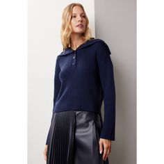 Blue knit (70% Acrylic, 30% Wool). Sweater. Long sleeves. Turtleneck. Front button closure. 20" from shoulder to hemline. Imported. Blue Polo Sweater With Ribbed Collar For Work, Navy Polo Sweater For Winter Workwear, Navy Button-up Winter Tops, Blue Collared Polo Sweater For Fall, Navy Buttoned Tops For Fall, Knit Button Polo Sweater For Fall, Knit Polo Sweater With Buttons For Fall, Fall Knit Polo Sweater With Buttons, Navy Collared Sweater For Winter