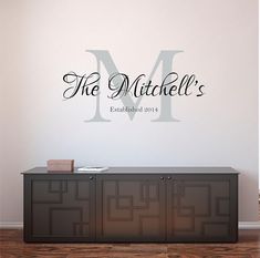 a wall decal that says the mitchell's on it in black and white