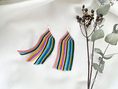 "These are multicolored nature beaded earrings made with inspiration taken at Rainbow Mountain in Peru. It also makes an excellent gift for birthdays, anniversaries, mother's day, valentine's day, Bridesmaid gift, and more. ♡ Total Length - 4.5'' (11,4 cm)/3.5\" (9 cm)/2.1'' (5,5 cm) ♡ Quality Czech beads If you like these colorful seed bead earrings but would like them in a different color or size please email me and I do a special custom order. I accept payments through Paypal. The colors can Colorful Handmade Beaded Earrings As Gift, Colorful Handmade Beaded Earrings For Gift, Multicolor Round Bead Earrings For Gifts, Multicolor Handwoven Earrings Gift, Multicolor Handwoven Earrings For Gift, Handmade Multicolor Beaded Drop Earrings, Multicolor Tiny Beads Earrings For Gift, Multicolor Beaded Drop Earrings As Gift, Multicolor Beaded Drop Earrings For Gift