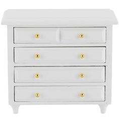 a white dresser with gold knobs on the top and bottom drawers, against a white background