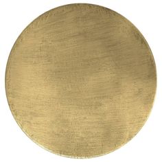 a round gold metal object on a white background