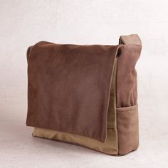 "Camel Brown Large Vegan Messenger Bag, Durable Canvas Laptop Bags, Crossbody / Shoulder Bag for Men, Gift for Him A classic unisex messenger bag, made from a mix of fabrics, textures, and colors that create a wide variety of unique pieces available. This bag perfect for university and college students, as well as for work. It is large and convenient to accommodate large laptops, books, and folders (and your lunch too...). You can Customize this bag in any color you wish! write to us about which Khaki Shoulder Bag For Everyday Use, Brown Satchel Saddle Bag For Outdoor, Brown Shoulder Bag With Removable Pouch For Everyday, Brown Saddle Bag Satchel For Outdoor, Brown Shoulder Laptop Bag For Outdoor Use, Brown Shoulder Laptop Bag For Outdoor, Rectangular Khaki Shoulder Bag With Waxed Finish, Rectangular Canvas Shoulder Bag With Flat Pocket, Brown Outdoor Shoulder Laptop Bag