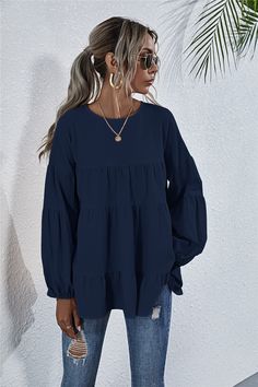 This ruffle-gathered blouse is a must-have for fall! Detailed with ruffle details long the sleeves and body of the top. the chic piece is light and easy to style with your jeans or sneakers. Feature a round neckline. lantern sleeves. and loose relaxed fit. MATERIAL: 100% Polyester MEASUREMENTS: Blouse Gathered Length 27-29in Small | Bust & Hem: 46-48 Medium |Bust & Hem: 48-50 Large |Bust & Hem: 50-52 XL |Bust & Hem: 52-54 Casual Tops With Bishop Blouson Sleeves, Casual Long Sleeve Blouse With Elastic Sleeves, Casual Long Sleeve Tops With Elastic Sleeves, Trendy Billowy Tops With Lantern Sleeves, Billowy Long Sleeve Tops For Fall, Billowy Balloon Sleeve Tops For Fall, Fall Tops With Ruffles And Balloon Sleeves, Fall Balloon Sleeve Tops With Ruffles, Casual Blouse With Gathered Long Sleeves