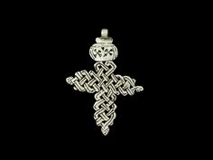 Ethiopian early 20th century traditional ethnic Coptic cross pendant of coin silver, hand engraved both sides and weighs 26.5g and its size is 3" w 2". Hand Engraving, Cross Pendant, Beauty Book, Accessory Gift, Display Homes, Electronic Accessories, Paper Party Supplies, Pendant, Craft Supplies