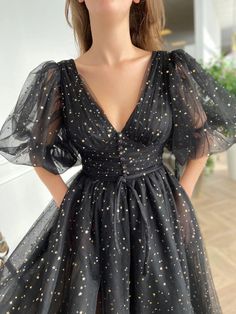 Details:-Starry tulle fabric-Black color with golden/silver stars-Tea length style with buttoned top and half puff sleeves Starry Night Dress, Tea Length Prom Dress, Easter Dresses For Toddlers, Hoco Dresses Long Sleeve, Hoco Dresses Long, Prom Dresses With Pockets, 파티 드레스, Evening Dresses With Sleeves, Lace Formal Dress