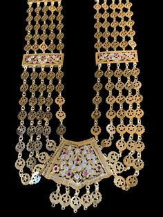 chandan haar made using 22ct gold plated motifs cz polki length of the necklace 14 inch , back chain length on each side is 5 inch width of necklace 2.2 inch Ceremonial Gold Plated Chandbali Kundan Necklace, Ceremonial Chandbali Kundan Necklace In Gold Plated, Bollywood Style Gold-plated Tilla Necklace, Bollywood Style Festive Temple Long Necklace, Gold Long Temple Necklace With Intricate Design, Gold Temple Necklace With Intricate Design, Gold Long Temple Necklace With Tilla, Traditional Gold Plated Chain Necklace For Festive Occasions, Heavy Gold Bollywood Necklace