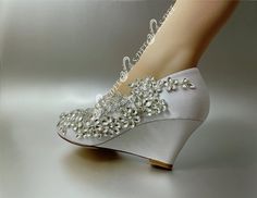 Rhinestone style is made with Czech Glass Crystal Rhinestones, real silver base, not cheap acrylic ones. Heel size: Closed Toe WedgeModel Shoes are size 36, larger sizes may have different appearance SIZE COVERSION （Only for reference） US 5-5.5UK 3-3.5EURO 35 Length(mm) 228.8 US 5.5-6UK 3.5-4EURO36 Length(mm) 235.4 US 6.5-7UK 4.5-5EURO 37Length(mm)242 US 7.5-8UK 5.5-6EURO 38Length(mm)248.6 US 8.5UK6.5EURO39 Length(mm)255.2 US 9UK 7EURO 40Length(mm)261.8 US 9.5-10UK 7.5-8EURO 41 Length(mm)268.4 U Wedding Shoes Wedge, Wedding Wedges, Closed Toe Wedges, Wedge Wedding Shoes, Bridal Heels, Rhinestone Shoes, Satin Pumps, Womens Wedding Shoes, Rhinestone Bridal