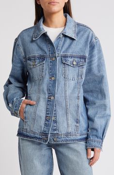 Tap into the oversized trend with this roomy denim jacket featuring eye-catching distressing for rugged character. Front button closure Spread collar Chest button-flap patch pockets Unlined 100% cotton Machine wash, tumble dry Imported Oversized Medium Wash Denim Jacket, Oversized Medium Wash Denim Jacket With Button Closure, Oversized Button-up Denim Jacket, Oversized Denim Jacket With Button Closure, Oversized Distressed Denim Jacket In Medium Wash, Oversized Denim Blue Jacket With Frayed Hem, Oversized Denim Outerwear With Frayed Hem, Oversized Distressed Denim Jacket, Oversize Denim Jacket