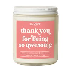 a jar of thank you for being so awesome scented candle with pink label and white lid