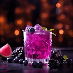 a purple drink with ice and berries around it