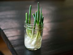 there are two pictures one has green onions and the other has onion stalks in it