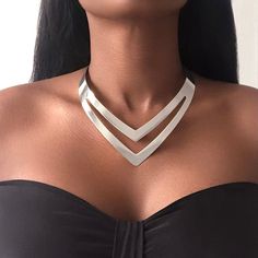 Introducing our minimalist double V-shape necklace, elegant necklace design that accentuates your neckline glamorously. Choose from a quality, gold or silver plating and add the final touch to your day to evening look.   Product Details - Material: Alloy, Iron - - Our products are all nickel free and lead free - Necklace: - Size: Perimeter : 11.5cm , Height : 4cm- - Weight :  50g -   🚚 Next Day Delivery 🎁 Free Gift Packaging *The JARLIA BY JOLINA collection consists of African Egyptian luxury Trendy Silver Choker For Formal Occasions, Trendy Silver Formal Choker, Silver Metal Choker For Evening, Minimalist Silver Choker With Clavicle Chain, Chic Silver Clavicle Chain Jewelry, Trendy Silver Necklace For Formal Occasions, Silver Y-shape Jewelry For Party, Modern Silver Necklace For Evening, Modern Party Choker Necklace