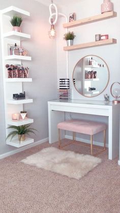 a white desk with a mirror, shelfs and plants on it in a room