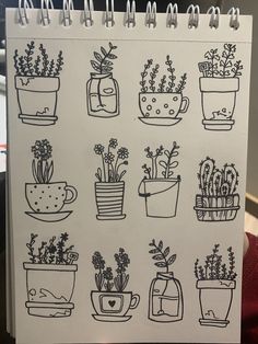 a drawing of potted plants on a notepad