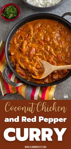 an image of coconut chicken and red pepper curry in a skillet with rice on the side