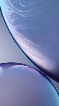 the back side of an iphone xr with blue and purple swirls on it