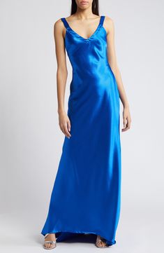 Elevate your next event look in this gorgeous satin gown designed with a sleek V-neckline, cross-back straps and a draped, body-defining silhouette. 59" length; 9" train (size Medium) Hidden back-zip closure V-neck Sleeveless Partially lined 97% polyester, 3% spandex Hand wash, line dry Imported Satin Gown Designs, Liquid Satin, Royal Blue Dress, Satin Gown, Designer Clothes For Men, Girly Outfits, Event Dresses, Wedding Attire, Women's Summer Fashion