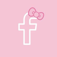 a pink wallpaper with a cross and a bow on it's head in the center