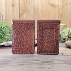 This full-grain leather Bar Clip Wallet is a great addition to your leather collection. It is now our best-selling wallet. It is made in a minimalist style and will fit nicely in your front pocket. This wallet will nicely hold a dozen bills and comes with an ID pocket, and 3 additional card pockets. These wallets come in several colors and leather hide options. All these leathers are full-grain leather and will age and patina nicely over time. *If you want this personalized with a name, initials, or a logo please add this Add-on Engraving Service to your order. Please leave a note at checkout with the name or initials. Email your logo to info@lazy3leatherco.com Specifics: 4 3/8" W x 2 3/4" H Due to the nature of tanning, the leather for these wallets will vary slightly in color and can be Classic Bifold Wallet With Leather Patch, Classic Trifold Wallet In Cognac For Everyday Use, Classic Cognac Trifold Wallet For Everyday Use, Rectangular Leather Trifold Wallet For Everyday Use, Brown Bifold Wallet With Leather Patch, Rectangular Cognac Wallets With Coin Pocket, Rectangular Cognac Wallet With Coin Pocket, Textured Leather Rectangular Wallet, Rectangular Textured Leather Wallet