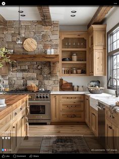 a kitchen with stone walls and wooden cabinets is shown in this screenshot from the app