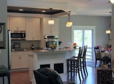 the kitchen and dining room are clean and ready for us to use in their new home