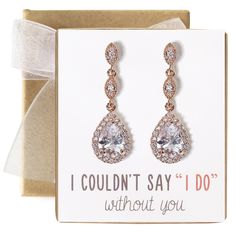 a card with a pair of earrings on it and the words, i couldn't say