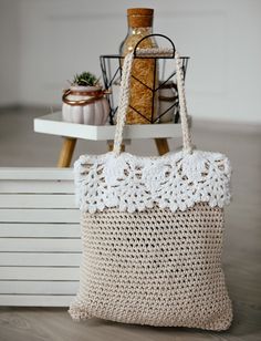 Very beautiful Crochet bag is made with natural matterial (cotton) that can be used for a long time and is ecological. A very stylish product that you can use as a daily bag. It can be a great gift or just a helpful thing for everyday usage. Width : 35 cm (about 13,77 in) Height: 38 cm (about 14,96in) Handmade Cream Jute Bag, Beige Crochet Beach Bag For Daily Use, Handmade Crochet Tote Bag For Crafting, White Crochet Bag For Daily Use, Bohemian White Crochet Bag Hand Knitted, White Bohemian Crochet Bag Hand-knitted, Everyday Beige Crochet Beach Bag, White Knitted Shoulder Bag For Beach, White Knitted Beach Shoulder Bag