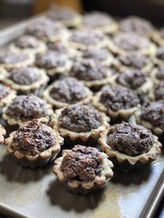 there are many cupcakes that are on the baking sheet and ready to be eaten