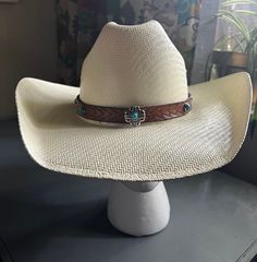 Handmade leather hat band to spruce up that cowboy hat. Made to order with custom measurements, color choice, stamp design, hardware & width. Giddy up y'all!! Leather Cowboy Hat Bands, Artisan Leather Hat Bands For Western-themed Events, Classic Beige Hat Bands For Western-themed Events, Luxury Leather Hat Bands For Western-themed Events, Western Hat Bands With Upf 50+ And Flat Brim, Western Adjustable Hand-tooled Hat Bands, Cowboy Hat Bands, Leather Cowboy Hats, Hat Bands