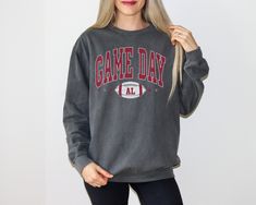 Important holiday update: Christmas delivery on orders placed after Dec. 8th are not guaranteed to arrive before Christmas. If placing an order after this date, refunds will not be offered due to arrival post Christmas holiday. Alabama football game day sweatshirt. This sweatshirt has a vintage and distressed font. Alabama comfort colors sweatshirt is super cozy.  Each sweatshirt comes with a relaxed fit, a rolled-forward shoulder, and a back neck patch.  .: 80% ring-spun cotton, 20% polyester .: Medium-heavy fabric  .: Relaxed fit .: Sewn in twill label .: OEKO-TEX certified low-impact dyesThe holiday season is upon us! In order to receive Christmas products on time, we have set order deadlines. For US sales, order by Dec.7th. For International sales, place orders by Nov. 30th. Thank you! Collegiate Sweatshirt For Game Day, Oversized Varsity Sweatshirt For Game Day, Collegiate Sweatshirt For Game Day In Fall, Collegiate Style Sweatshirt For Game Day In Fall, Game Day Fan Apparel Sweatshirt For Fall, Game Day Team Spirit Sweatshirt With Lettering, Relaxed Fit Sweatshirt For College Football Season, Football Season Game Day Cotton Sweatshirt, Game Day Fan Apparel Sweatshirt With Lettering