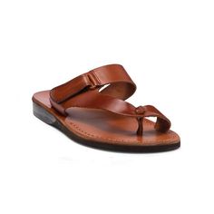 Rafael men's leather sandals step up your footwear wardrobe. These leather toe loop sandals are handcrafted in Jerusalem by skilled artisans who keep an eye on the details. This minimalist style features easy slide-on design with a Velcro strap across the instep that adjusts quickly and a toe ring for added stability. These high-quality men's leather sandals are built to last for years from 100% vegetable tanned leather that delivers unparalleled resilience The smooth leather insole molds to the Mens Slide Sandals, Ankle Strap Sandals Flat, Tan Leather Sandals, Toe Loop Sandals, Soft Leather Handbags, Mens Shoes Sandals, Mens Leather Sandals, Leather Gladiator Sandals, Closed Toe Sandals