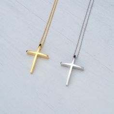 Minimal solid gold handmade cross necklace, curved 14k solid gold cross pendant. This is a beautiful handmade minimal cross with a curved front that makes it a bit different and unique. Available in 14k yellow and 14k white gold , please make your choice from the drop down menu. Minimal cross necklace, unisex pendant. Size: 1,7 cm / 0.7 inches long and 0.7 cm / 0,3 inches wide Material: 14k solid yellow gold or 14k solid white gold You can choose the charm with a yellow gold filled chain (white Minimalist Cross Pendant Necklace As Gift, Minimalist Crucifix Necklace As A Gift, Minimalist Crucifix Necklace For Gift, Yellow Gold Pendant Cross Necklace For Gift, Yellow Gold Cross Pendant Necklace Gift, Yellow Gold Pendant Cross Necklace As Gift, Gift 14k Gold Cross Necklace, Minimalist White Gold Cross Necklace For Gift, Minimalist White Gold Cross Necklace As Gift